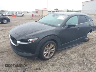 2020 Mazda CX-30 Select with VIN 3MVDMBCL3LM104988, listed as a IAAI auction lot 41951565 with 53,685 mi miles and . Bid and sale history available at DreamBid. Image 2.