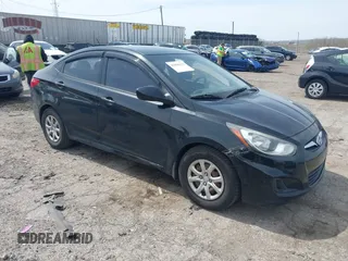 2012 Hyundai Accent GLS with VIN KMHCT4AE1CU260048, listed as a IAAI auction lot 42056125 with 168,530 mi miles. Bid and sale history available at carsss.com. Image 1.