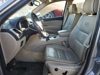 2014 Jeep Grand Cherokee Overland with VIN 1C4RJFCG0EC226397, listed as a Copart auction lot 80295784 with 131,921 mi miles and Salvage Title. Bid and sale history available at DreamBid. Image 7.