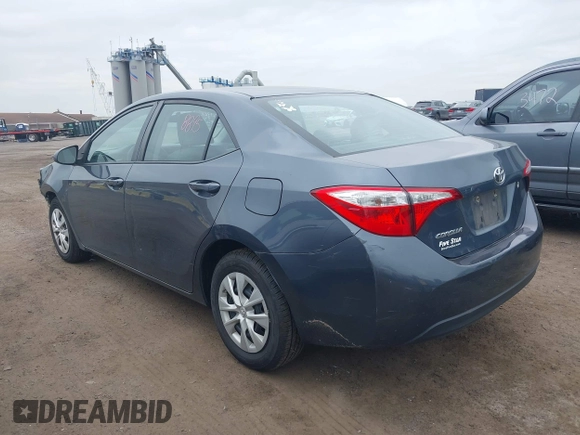 2014 Toyota Corolla L with VIN 2T1BURHE5EC027497, listed as a IAAI auction lot 42602880 with 101,094 mi miles and . Bid and sale history available at DreamBid. Image 3.