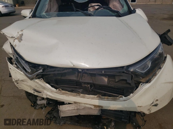 2018 Honda CR-V EX-L z VIN 2HKRW2H82JH672268, wystawiony jako Copart lot #59413585 z przebiegiem Nie podano mil oraz Szkoda całkowita • Salvage title. Historia ofert i sprzedaży dostępna na DreamBid. Obrazek 11.