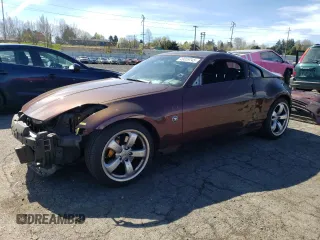 2006 Nissan 350Z with VIN JN1AZ34D36M301973, listed as a Copart auction lot 49859745 with 92,386 mi miles and Salvage title. Bid and sale history available at DreamBid. Image 1.