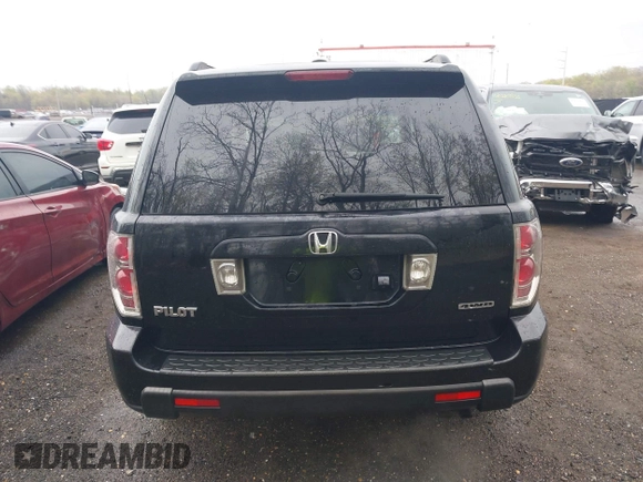 2006 Honda Pilot EX-L with VIN 5FNYF18776B021690, listed as a IAAI auction lot 42016219 with 239,666 mi miles and . Bid and sale history available at DreamBid. Image 16.