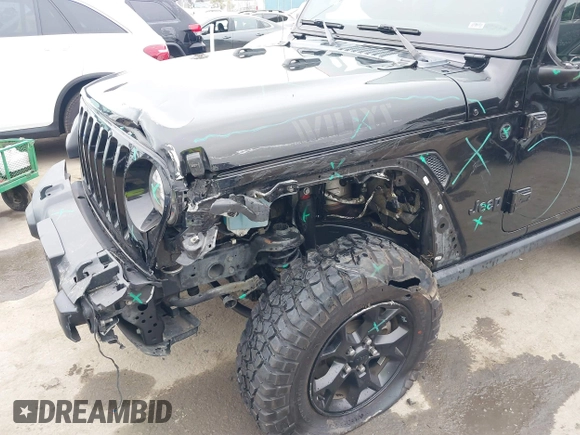 2021 Jeep Wrangler Sport with VIN 1C4GJXAN5MW627228, listed as a IAAI auction lot 42170010 with 56,965 mi miles and . Bid and sale history available at DreamBid. Image 6.
