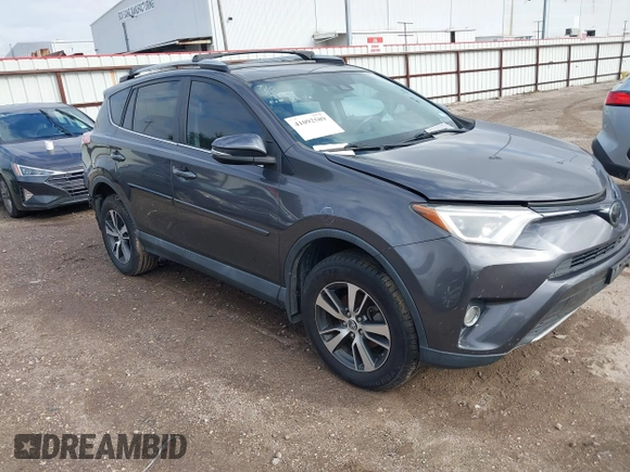 2018 Toyota RAV4 XLE with VIN 2T3WFREV4JW417555, listed as a IAAI auction lot 41092589 with 93,788 mi miles and . Bid and sale history available at DreamBid. Image 1.