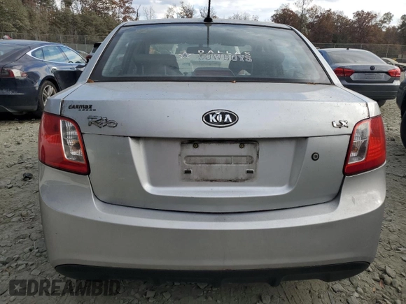 2010 Kia Rio LX with VIN KNADH4A38A6627955, listed as a Copart auction lot 43702265 with 138,005 mi miles and Non Repairable. Bid and sale history available at carsss.com. Image 6.