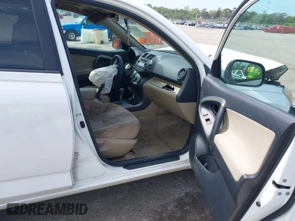 2012 Toyota RAV4 with VIN 2T3ZF4DV2CW111751, listed as a IAAI auction lot 41877351 with 129,579 mi miles. Bid and sale history available at carsss.com. Image 5.