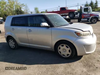 2010 Scion xB with VIN JTLZE4FEXA1098327, listed as a Copart auction lot 54733025 with 151,331 mi miles and Salvage Title. Bid and sale history available at DreamBid. Image 4.
