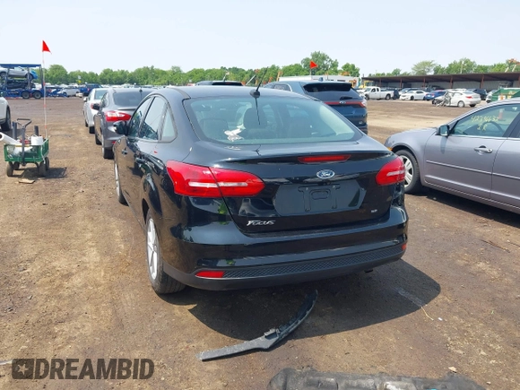 2017 Ford Focus SE with VIN 1FADP3F25HL292056, listed as a IAAI auction lot 42409320 with 102,956 mi miles and . Bid and sale history available at DreamBid. Image 16.