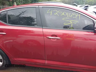 2015 Kia Optima LX with VIN 5XXGM4A7XFG455242, listed as a IAAI auction lot 42501654 with 139,209 mi miles and . Bid and sale history available at DreamBid. Image 13.
