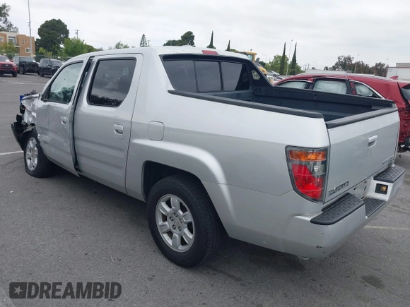 2006 Honda Ridgeline RTL with VIN 2HJYK16566H532598, listed as a IAAI auction lot 42184828 with 91,817 mi miles and . Bid and sale history available at DreamBid. Image 3.
