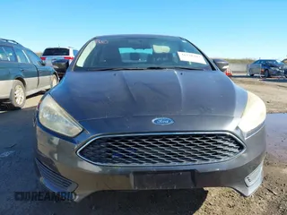 2016 Ford Focus SE z VIN 1FADP3F27GL321507, wystawiony jako IAAI lot #41278203 z przebiegiem 157 910 mil mil oraz . Historia ofert i sprzedaży dostępna na DreamBid. Obrazek 12.