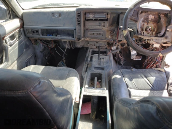 1995 Jeep Cherokee with VIN 1J4FN78S5SL557086, listed as a Copart auction lot 74221184 with 416,415 mi miles and Salvage title. Bid and sale history available at DreamBid. Image 8.