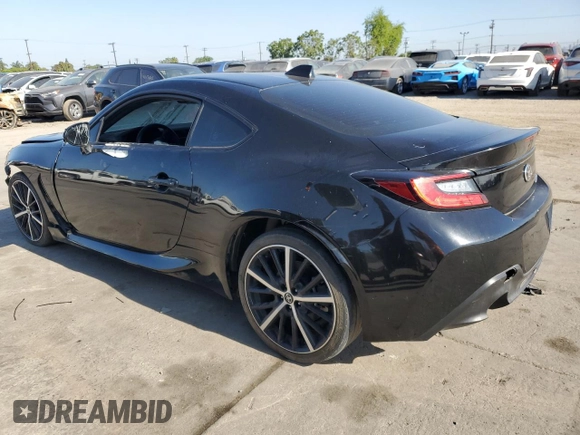 2023 Toyota 86 z VIN JF1ZNBB13P9750286, wystawiony jako Copart lot #57180095 z przebiegiem 11 630 mil mil oraz Szkoda całkowita • Salvage title. Historia ofert i sprzedaży dostępna na DreamBid. Obrazek 2.