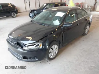 2013 Volkswagen Jetta SE z VIN 3VWDX7AJ7DM267911, wystawiony jako IAAI lot #42391353 z przebiegiem 42 248 mil mil oraz . Historia ofert i sprzedaży dostępna na DreamBid. Obrazek 6.