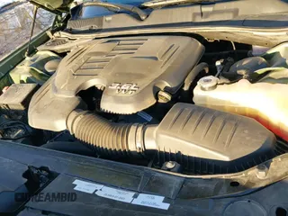 2021 Dodge Challenger SXT z VIN 2C3CDZGG6MH607468, wystawiony jako IAAI lot #41337045 z przebiegiem 48 927 mil mil oraz . Historia ofert i sprzedaży dostępna na DreamBid. Obrazek 21.