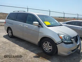 2007 Honda Odyssey EX-L with VIN 5FNRL38757B431334, listed as a IAAI auction lot 42026018 with 135,898 mi miles. Bid and sale history available at carsss.com. Image 1.