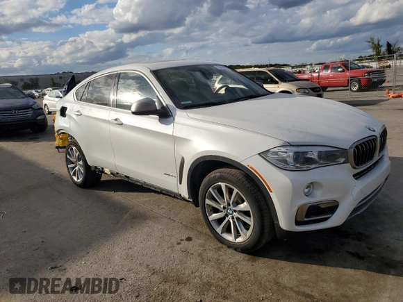 2018 BMW X6 xDrive35i with VIN 5UXKU2C52J0Z62235, listed as a Copart auction lot 76004803 with 72,379 mi miles. Bid and sale history available at carsss.com. Image 4.