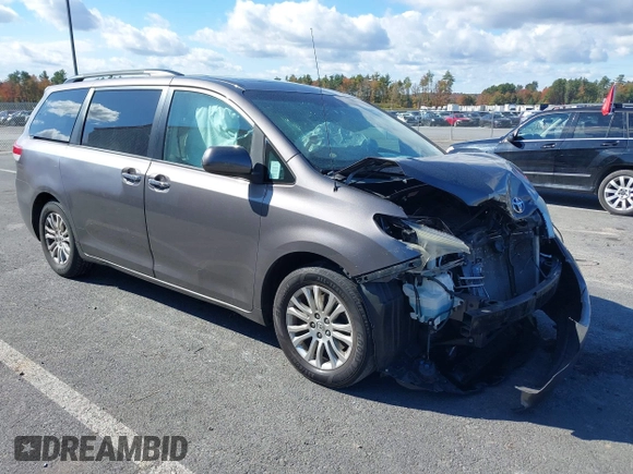 2014 Toyota Sienna XLE with VIN 5TDYK3DC1ES472036, listed as a IAAI auction lot 40546573 with 134,907 mi miles and . Bid and sale history available at DreamBid. Image 1.