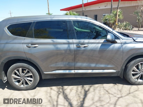 2019 Hyundai Santa Fe SEL Plus z VIN 5NMS33AD6KH099865, wystawiony jako IAAI lot #42007106 z przebiegiem 103 095 mil mil oraz . Historia ofert i sprzedaży dostępna na DreamBid. Obrazek 13.
