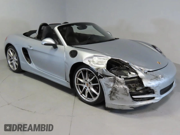 2014 Porsche Boxster with VIN WP0CA2A83ES120705, listed as a Copart auction lot 48166935 with 65,603 mi miles and Salvage title. Bid and sale history available at DreamBid. Image 1.