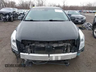 2014 Cadillac XTS Platinum with VIN 2G61W5S84E9291640, listed as a IAAI auction lot 41877867 with 100,462 mi miles and . Bid and sale history available at DreamBid. Image 12.