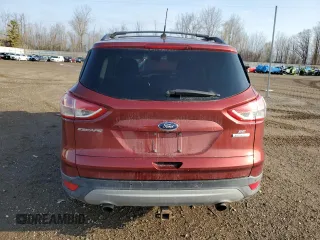 2016 Ford Escape SE with VIN 1FMCU0GX9GUB69534, listed as a Copart auction lot 52938155 with 142,216 mi miles and Clean Title. Bid and sale history available at carsss.com. Image 6.