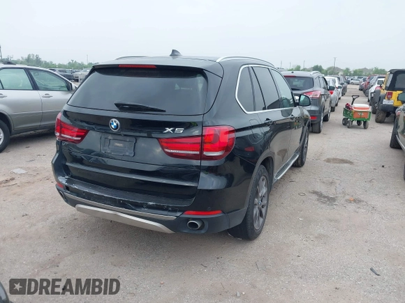 2014 BMW X5 xDrive35d with VIN 5UXKS4C56E0J93861, listed as a IAAI auction lot 41906775 with 149,263 mi miles. Bid and sale history available at carsss.com. Image 4.