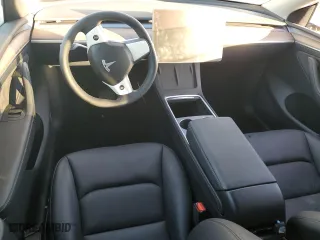 2024 Tesla Model Y with VIN 7SAYGDED1RF154851, listed as a Copart auction lot 87863255 with 5,878 mi miles and Salvage Title. Bid and sale history available at carsss.com. Image 8.