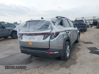 2023 Hyundai Tucson SEL with VIN 5NMJBCAE9PH173732, listed as a IAAI auction lot 42408802 with 37,378 mi miles and . Bid and sale history available at DreamBid. Image 4.