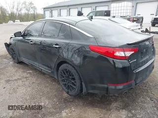 2013 Kia Optima SX with VIN 5XXGR4A65DG218034, listed as a IAAI auction lot 42027756 with 100,285 mi miles and . Bid and sale history available at DreamBid. Image 3.