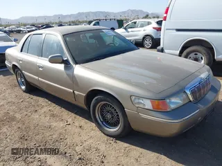 2002 Mercury Grand Marquis LS Premium with VIN 2MEFM75W32X636872, listed as a IAAI auction lot 41717410 with 88,840 mi miles and . Bid and sale history available at DreamBid. Image 1.