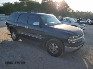 2002 Chevrolet Tahoe LS with VIN 1GNEC13ZX2J173770, listed as a Copart auction lot 52108985 with 273,327 mi miles and Salvage title. Bid and sale history available at DreamBid. Image 4.