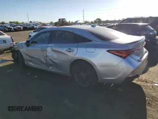 2021 Toyota Avalon Hybrid XSE z VIN 4T1EA1AB7MU005523, wystawiony jako Copart lot #56485694 z przebiegiem 117 297 mil mil oraz Szkoda całkowita • Salvage title. Historia ofert i sprzedaży dostępna na DreamBid. Obrazek 2.