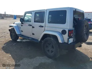 2012 Jeep Wrangler Unlimited Sahara with VIN 1C4HJWEG9CL146750, listed as a IAAI auction lot 41512678 with 94,952 mi miles. Bid and sale history available at carsss.com. Image 3.
