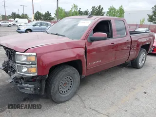 2015 Chevrolet Silverado 1500 LT with VIN 1GCRCRECXFZ238190, listed as a IAAI auction lot 42056318 with 102,040 mi miles. Bid and sale history available at carsss.com. Image 2.