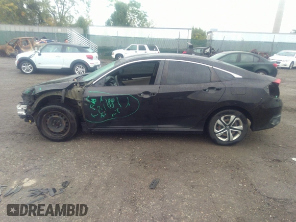2017 Honda Civic LX with VIN 2HGFC2F58HH570210, listed as a IAAI auction lot 40446375 with 69,724 mi miles and . Bid and sale history available at DreamBid. Image 14.
