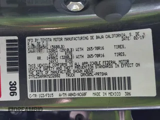 2019 Toyota Tacoma SR z VIN 3TMCZ5AN9KM232882, wystawiony jako IAAI lot #41879314 z przebiegiem Nie podano mil oraz . Historia ofert i sprzedaży dostępna na DreamBid. Obrazek 9.