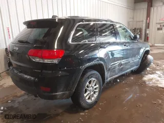 2018 Jeep Grand Cherokee Laredo E with VIN 1C4RJFAG3JC334865, listed as a IAAI auction lot 41599796 with 127,591 mi miles. Bid and sale history available at carsss.com. Image 4.