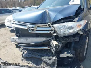 2012 Toyota Highlander with VIN 5TDBK3EH0CS130168, listed as a IAAI auction lot 42062786 with 144,215 mi miles. Bid and sale history available at carsss.com. Image 6.