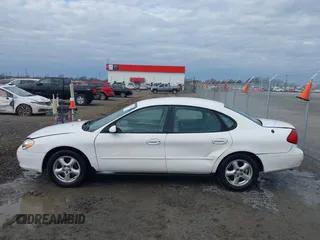 2002 Ford Taurus SES Standard with VIN 1FAFP55U12A184513, listed as a IAAI auction lot 41125306 with 241,896 mi miles. Bid and sale history available at carsss.com. Image 14.