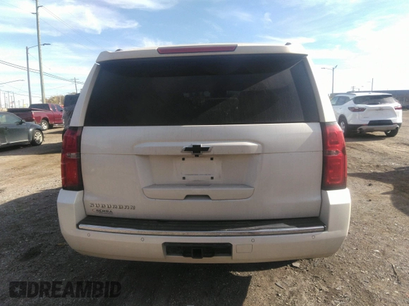 2015 Chevrolet Suburban LTZ with VIN 1GNSKKKC0FR551031, listed as a IAAI auction lot 40694559 with 184,261 mi miles. Bid and sale history available at carsss.com. Image 16.