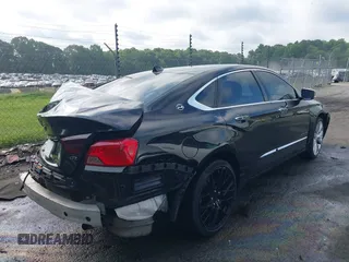 2014 Chevrolet Impala LTZ with VIN 2G1155S39E9102462, listed as a IAAI auction lot 42618513 with 121,943 mi miles and . Bid and sale history available at DreamBid. Image 4.