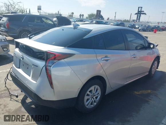 2018 Toyota Prius Two with VIN JTDKARFU2J3554502, listed as a IAAI auction lot 41592780 with 119,210 mi miles. Bid and sale history available at carsss.com. Image 4.