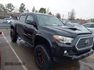 2019 Toyota Tacoma SR z VIN 3TMCZ5AN1KM247618, wystawiony jako IAAI lot #41734570 z przebiegiem 68 796 mil mil oraz . Historia ofert i sprzedaży dostępna na DreamBid. Obrazek 1.