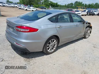 2020 Ford Fusion SE with VIN 3FA6P0LU4LR212740, listed as a IAAI auction lot 42374044 with 146,927 mi miles and . Bid and sale history available at DreamBid. Image 4.