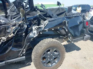 2023 Jeep Gladiator Sport S z VIN 1C6HJTAG2PL544870, wystawiony jako IAAI lot #42155013 z przebiegiem Nie podano mil oraz . Historia ofert i sprzedaży dostępna na DreamBid. Obrazek 18.