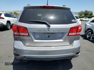 2017 Dodge Journey SXT z VIN 3C4PDCBG7HT547666, wystawiony jako Copart lot #57987875 z przebiegiem 124 484 mil mil oraz Szkoda całkowita • Salvage title. Historia ofert i sprzedaży dostępna na DreamBid. Obrazek 6.