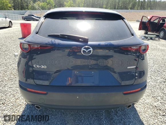 2021 Mazda CX-30 Select z VIN 3MVDMABL2MM232281, wystawiony jako Copart lot #51098235 z przebiegiem 46 052 mil mil oraz Nie do naprawy • Non repairable. Historia ofert i sprzedaży dostępna na DreamBid. Obrazek 6.