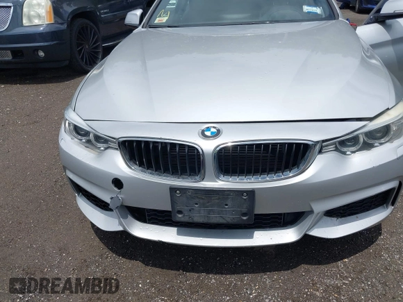 2014 BMW 4 Series 435i xDrive with VIN WBA3R5C55EK186196, listed as a IAAI auction lot 42678249 with 71,362 mi miles and . Bid and sale history available at DreamBid. Image 6.